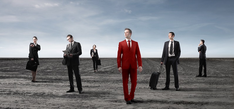 Business people in black and young businessman in red