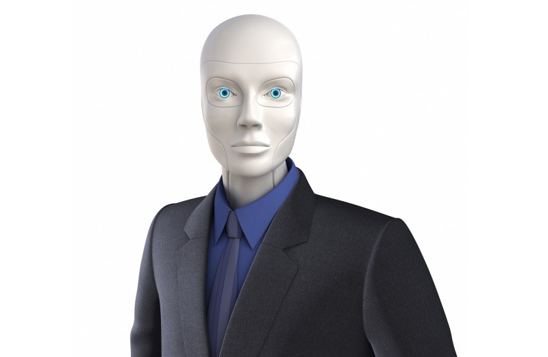 Robot dressed in a business suit  isolated on the white - Ιnsurancedaily.gr