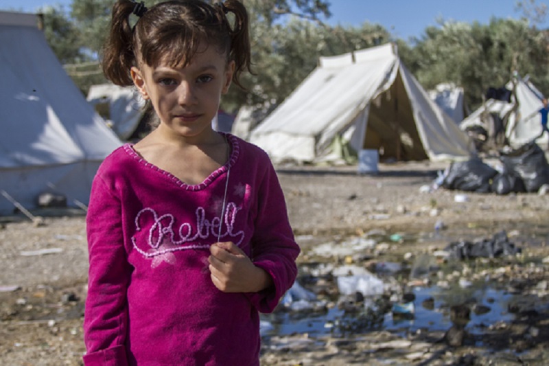 Dana, 5, is one of the many children that make the journey to Greece with their families. They stay in Kara Tepe transit camp, where they wait to eventually be registered and receive their papers to continue their journey into Europe.