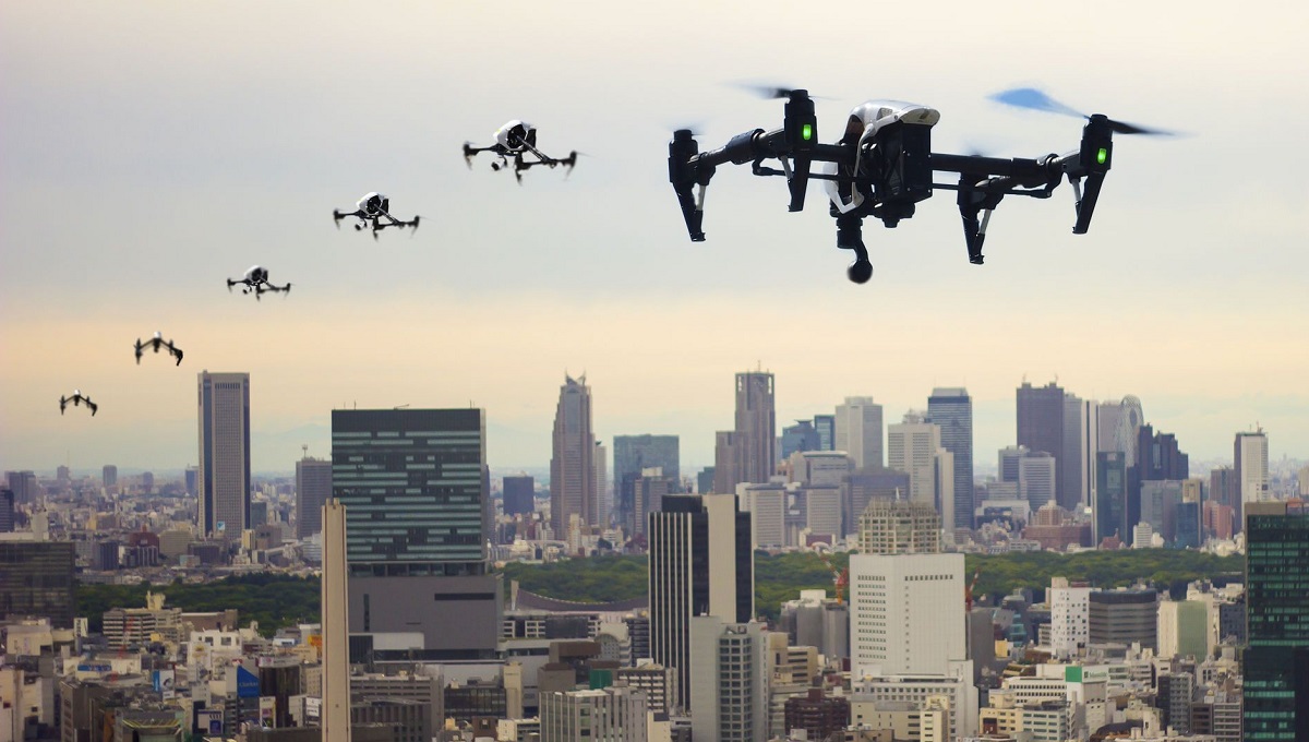 48063974 - flying through the town of drones tokyo japan image