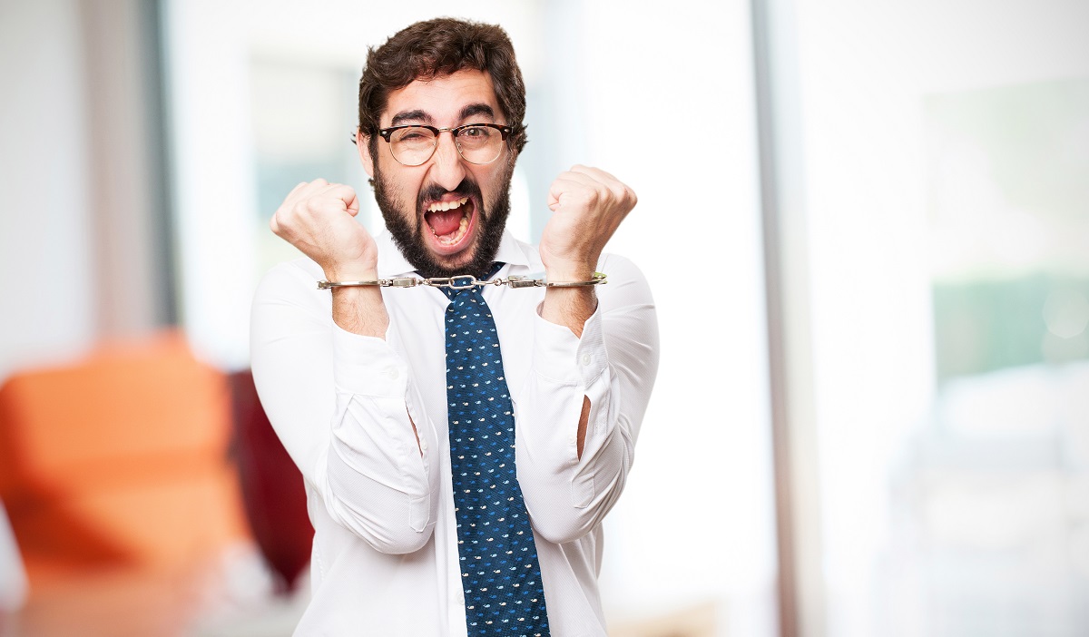businessman with handcuffs