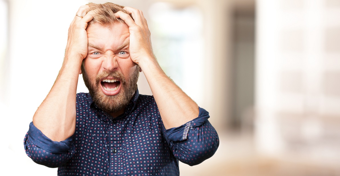 blond man angry expression