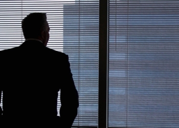 businessman looking the window