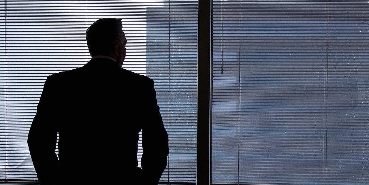 businessman looking the window