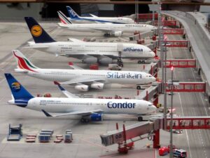 condor-airplane-on-grey-concrete-airport-insurancedaily