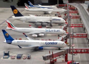 condor-airplane-on-grey-concrete-airport-insurancedaily