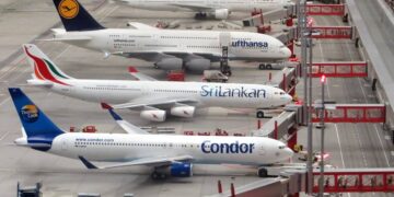 condor-airplane-on-grey-concrete-airport-insurancedaily