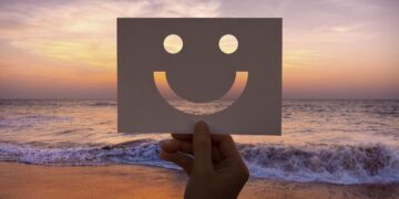 Happines cheerful perforated paper smiley face