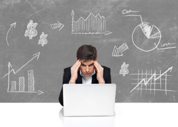 young-business-man-with-laptop-brainstorming-business-concept-sketch-draw