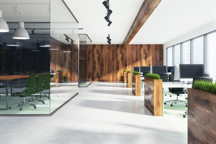 Natural style open space office interior with loft windows, a wooden floor, an aquarium like conference room area and rows of computer desks. 3d rendering
