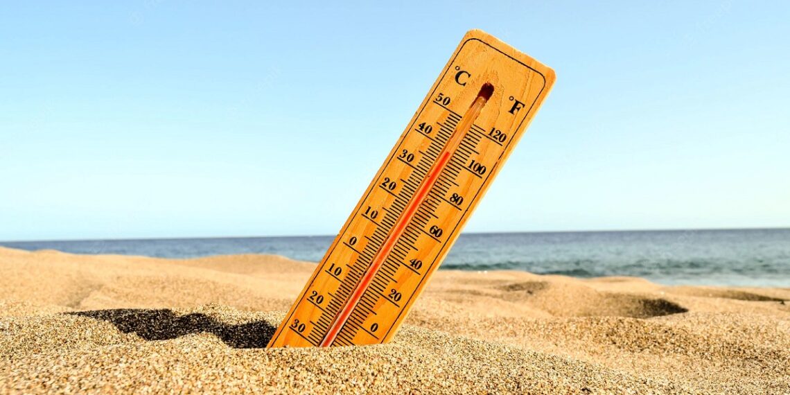 closeup-shot-thermometer-beach-sand
