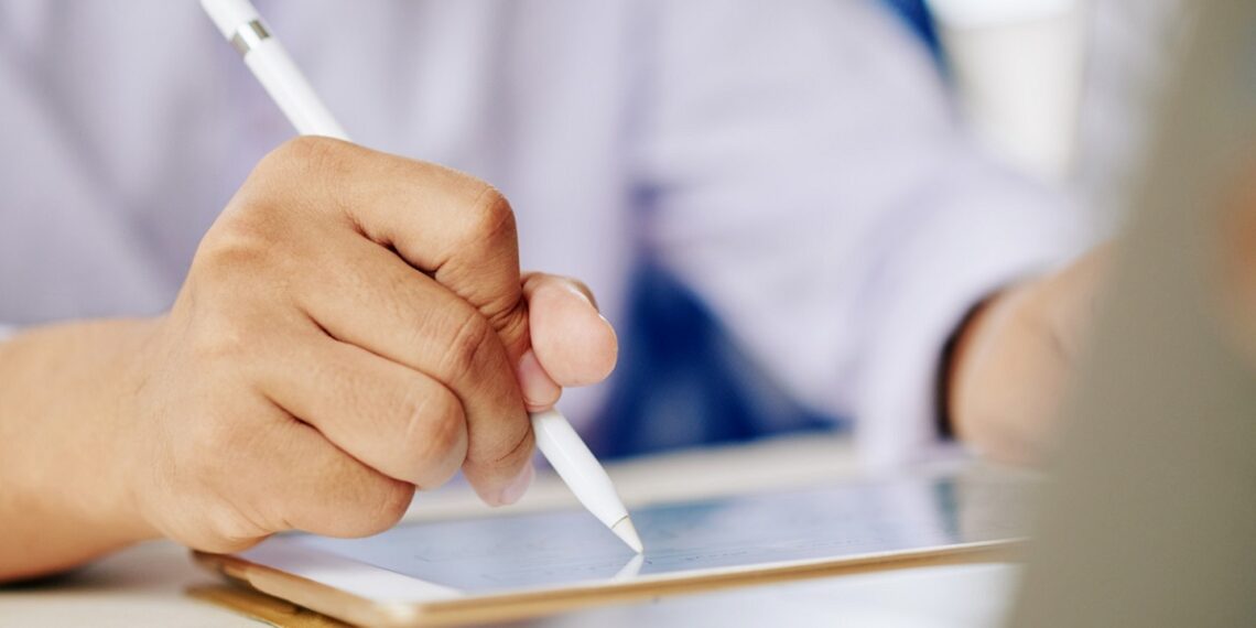 man-working-tablet-with-stylus