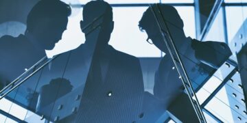 Outlines of group of businessmen working