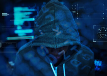 Hacker working in the darkness